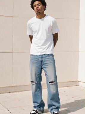 MNML Light Blue Relaxed Jeans with Knee Distress